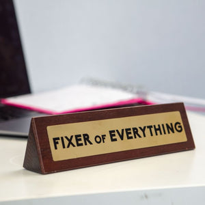 Fixer of Everything Sign